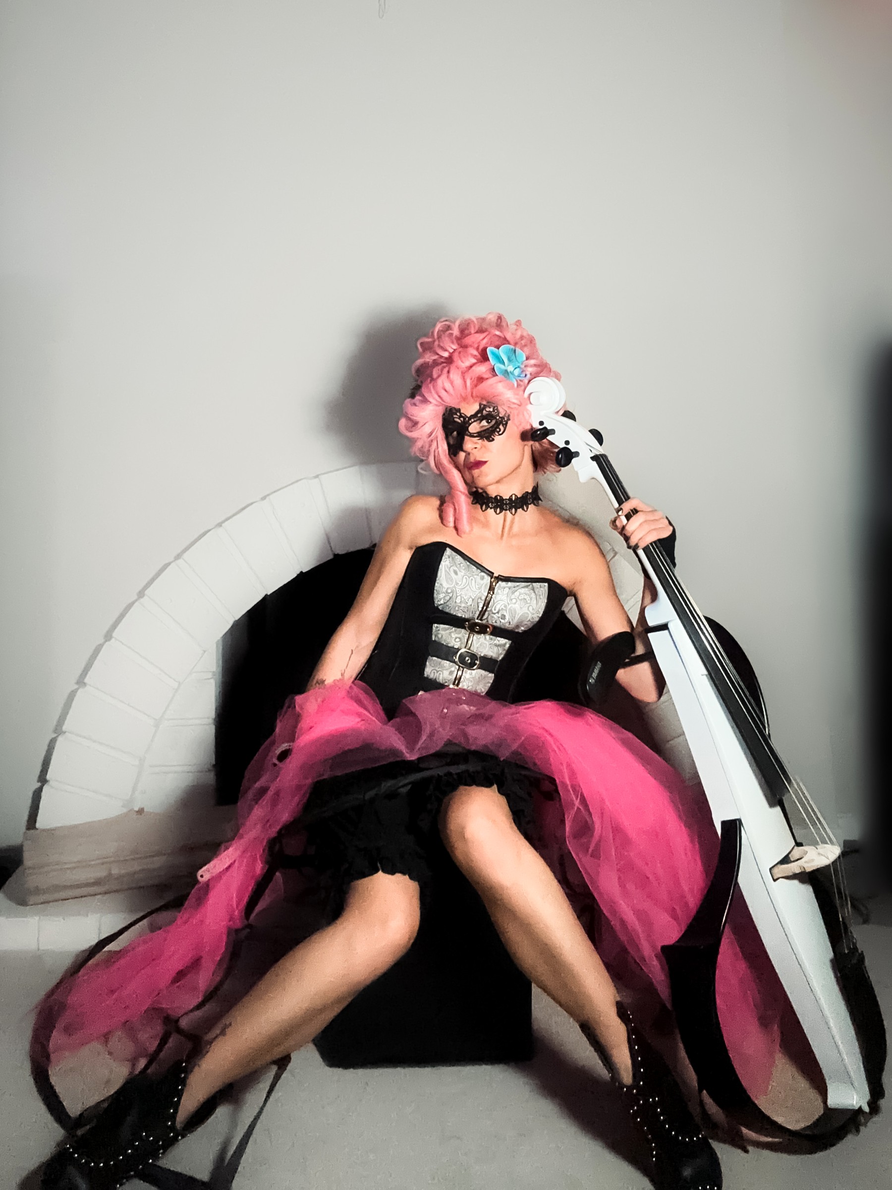 Elenka in masquerade look with electric cello — Bridgerton Experience